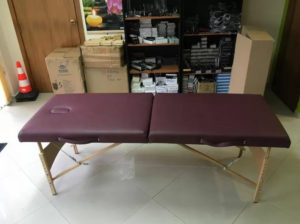 Inexpensive two-section massage bed - low-budget massage couch model