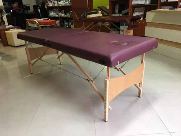 Inexpensive two-section massage bed - low-budget massage couch model