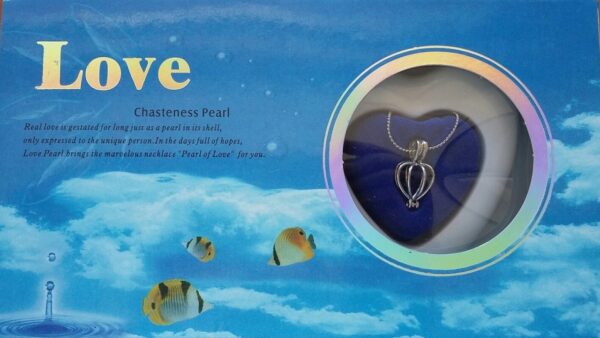 Pearl in a clam with necklace in a box with little fishes