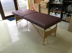 Inexpensive two-section massage bed - low-budget massage couch model