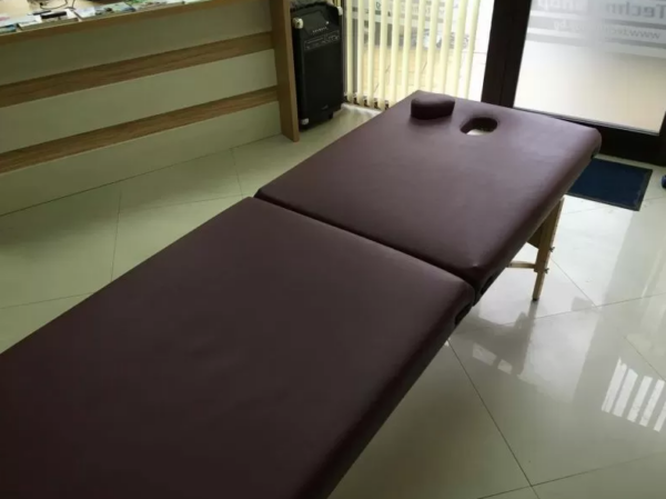 Inexpensive two-section massage bed - low-budget massage couch model