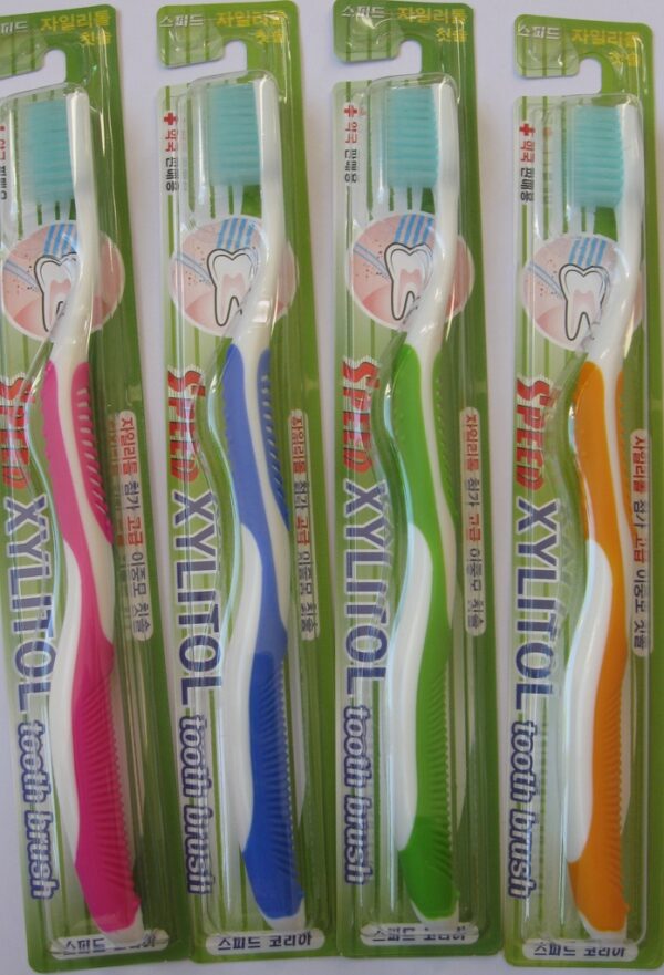 Antibacterial toothbrush with xylitol in four colors