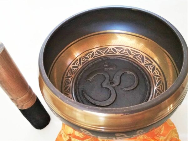 Antique Tibetan Om singing bowl with embossed bottom