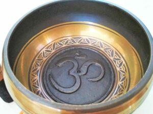 Antique Tibetan Om singing bowl with embossed bottom