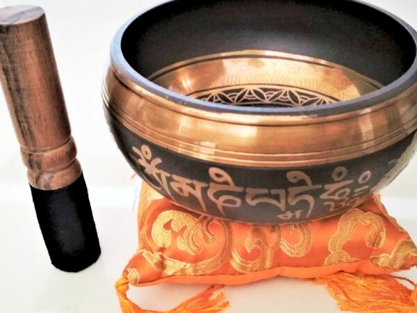 Antique Tibetan Om singing bowl with embossed bottom