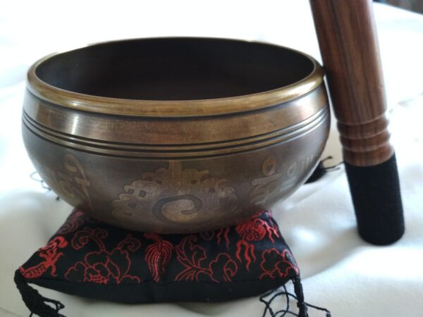 Antique Tibetan Om singing bowl with embossed bottom